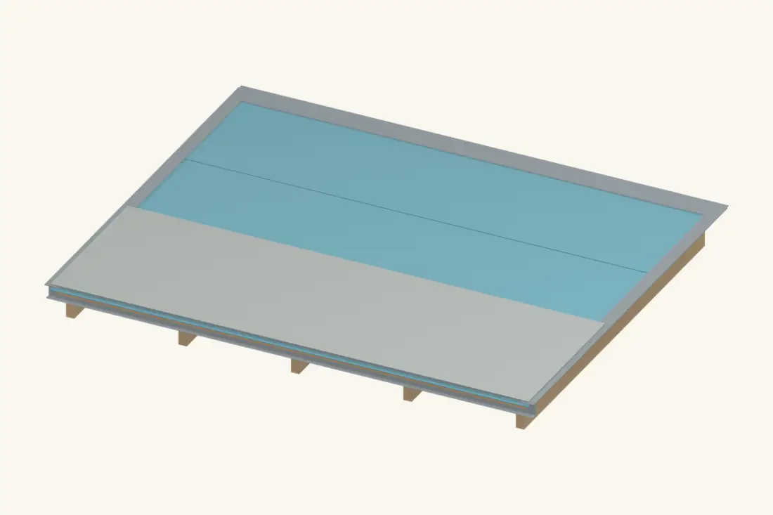 The first cap course leaves the base layer visible. Perimeter metal belongs between the base and cap in this system.
