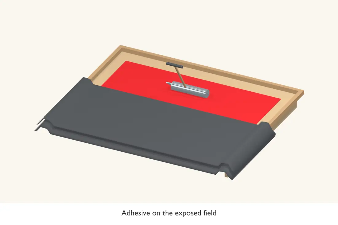 Spread the approved field adhesive on the absorbent deck area exposed by the folded sheet. Bright red identifies the current operation.