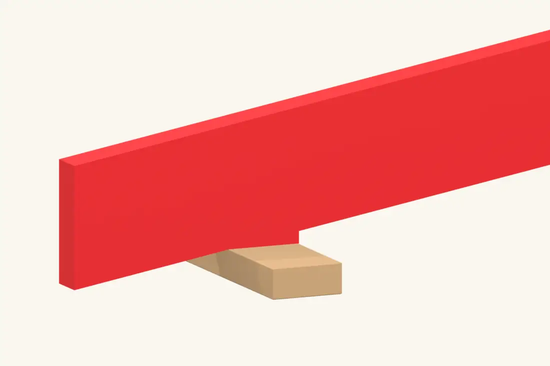 The low-wall seat bears flat on the plate; the retained timber continues into the tail. Bright red marks the part being installed or checked.